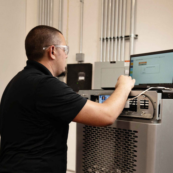 man-working-on-uninterrupted-power-supply