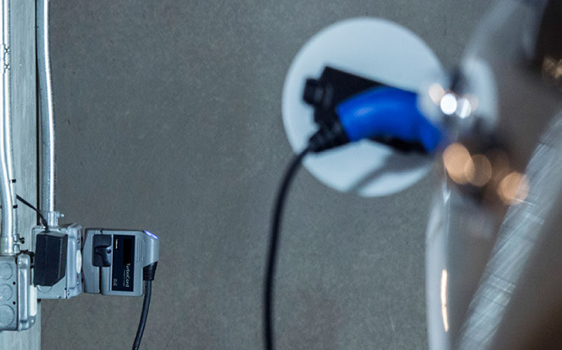 ev-charging-level-one-charger-in-car-plug-in-wall
